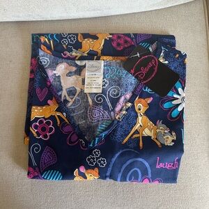 Whimsical! Women’s patterned Navy Blue NWT scrub top featuring Disney’s Bambi!